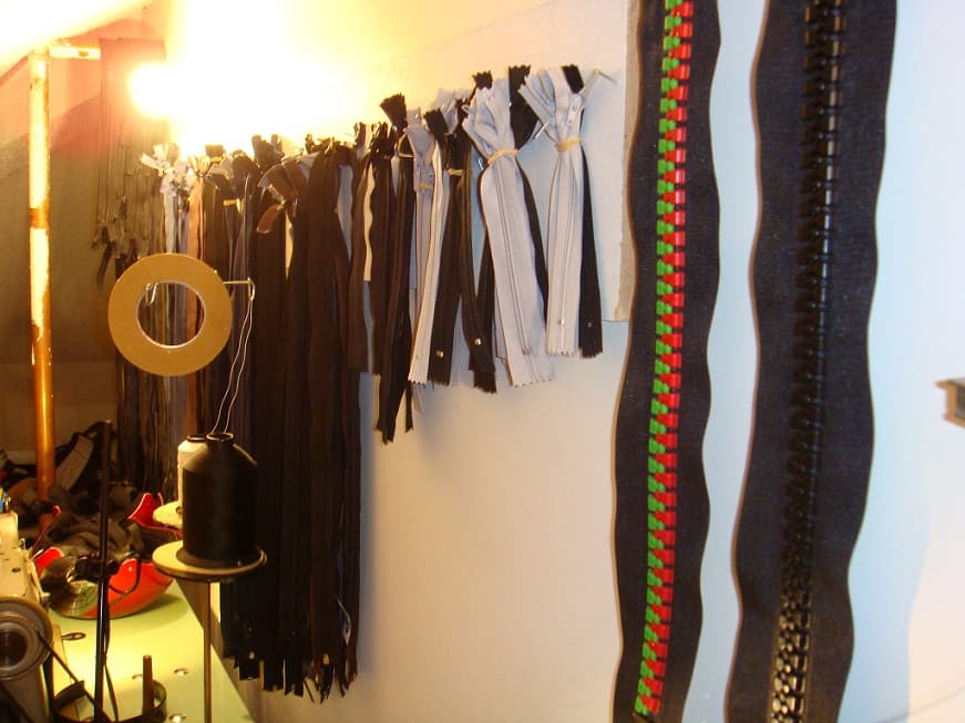 Wall of replacement zippers at the Outdoor Gear Doctor workshop